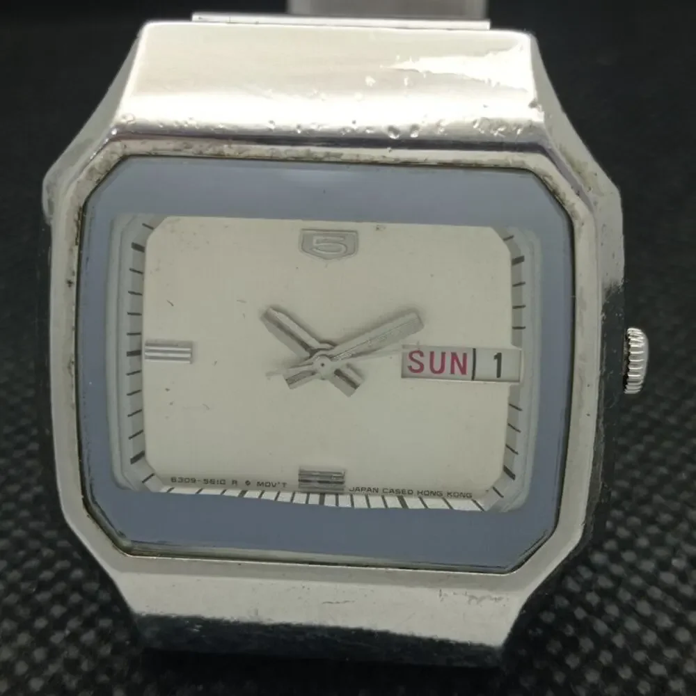 Vintage 1980 Seiko Automatic Mens Silver Watch W/daydate & White accents